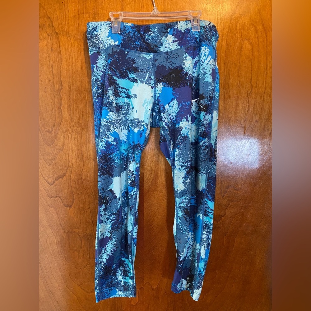 Nike women’s cropped Dri-Fit leggings L blue turquoise graphic print